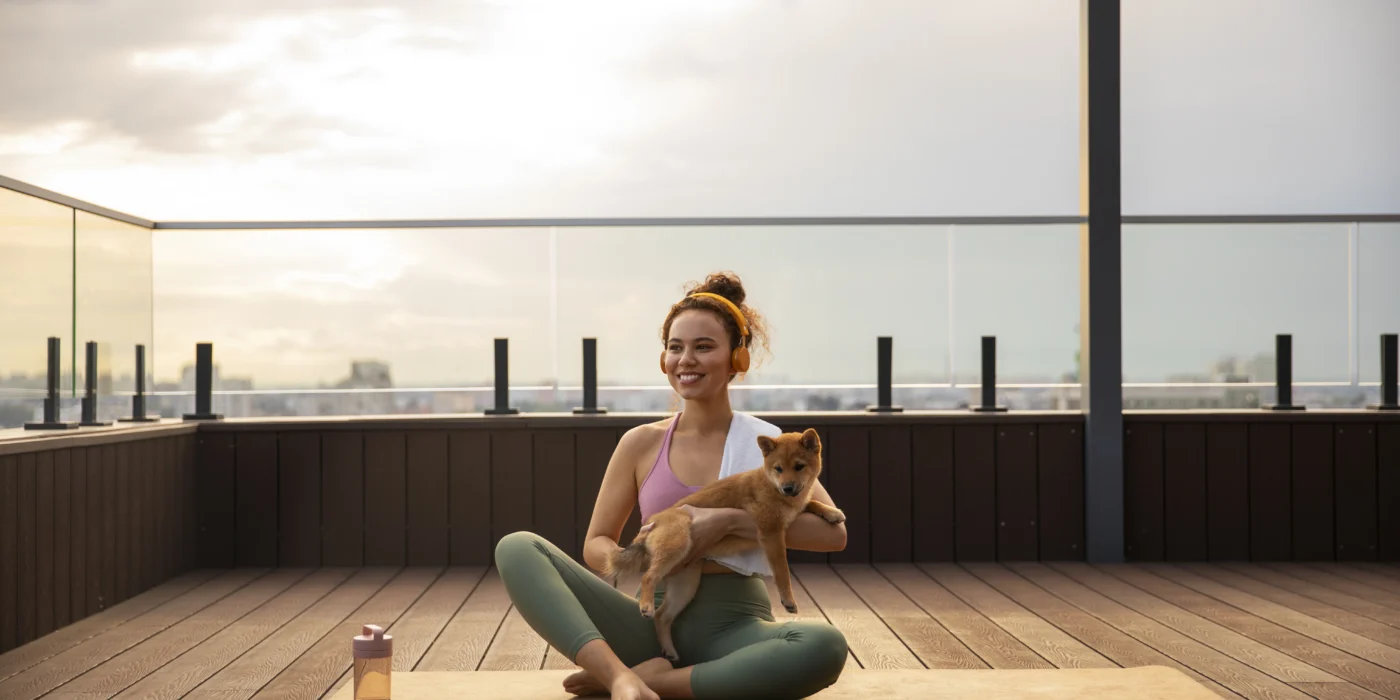full-shot-woman-doing-sport-with-dog