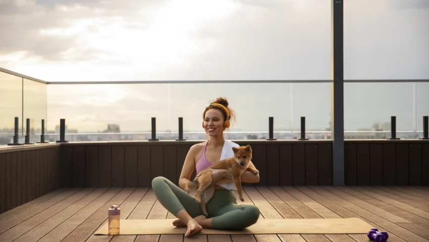full-shot-woman-doing-sport-with-dog