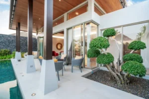 Modern villa with private outdoor space featuring landscaped garden and comfortable living area.