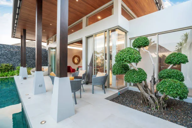 Modern villa with private outdoor space featuring landscaped garden and comfortable living area.