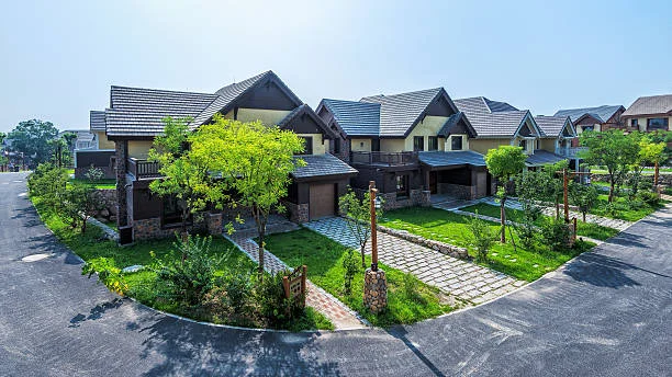 Premium villa community showing maintained landscapes, amenities, and residential upkeep services.