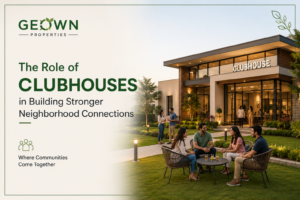 Residents socializing outside a modern clubhouse in a villa community designed to encourage neighborhood interaction and community engagement.