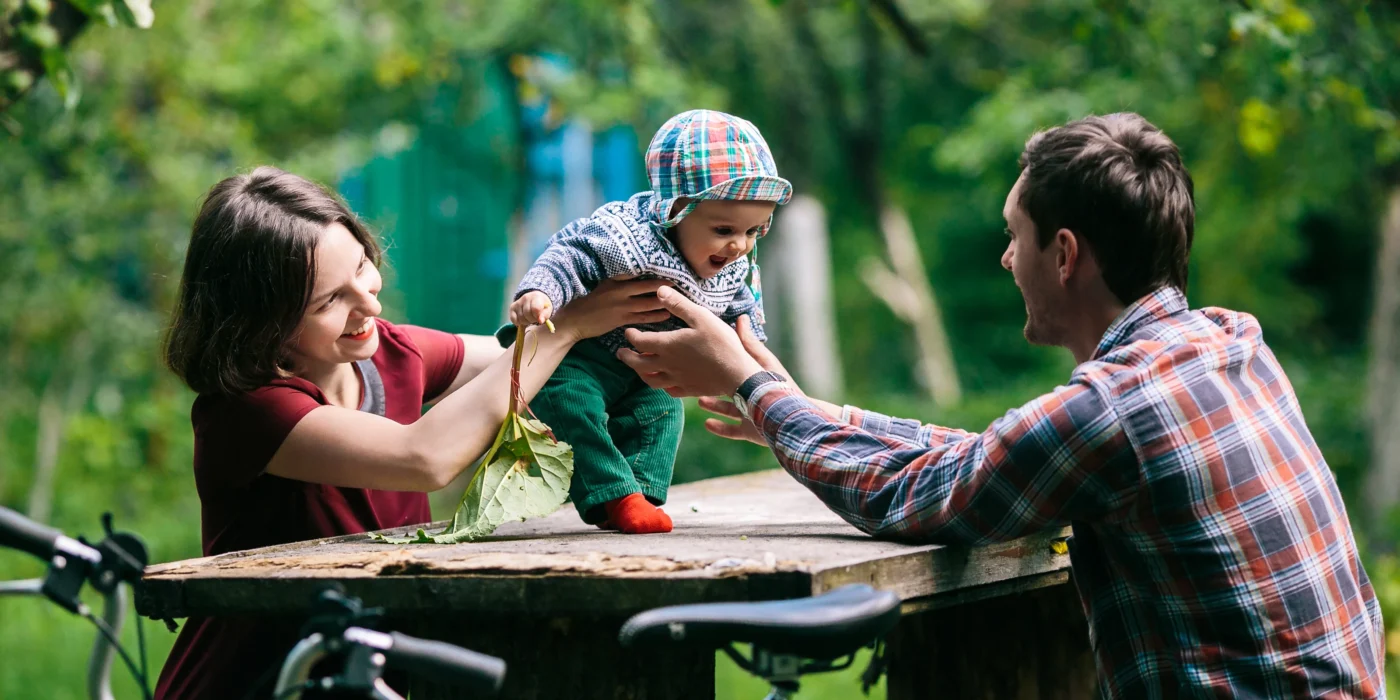 adorable-baby-with-parents-park